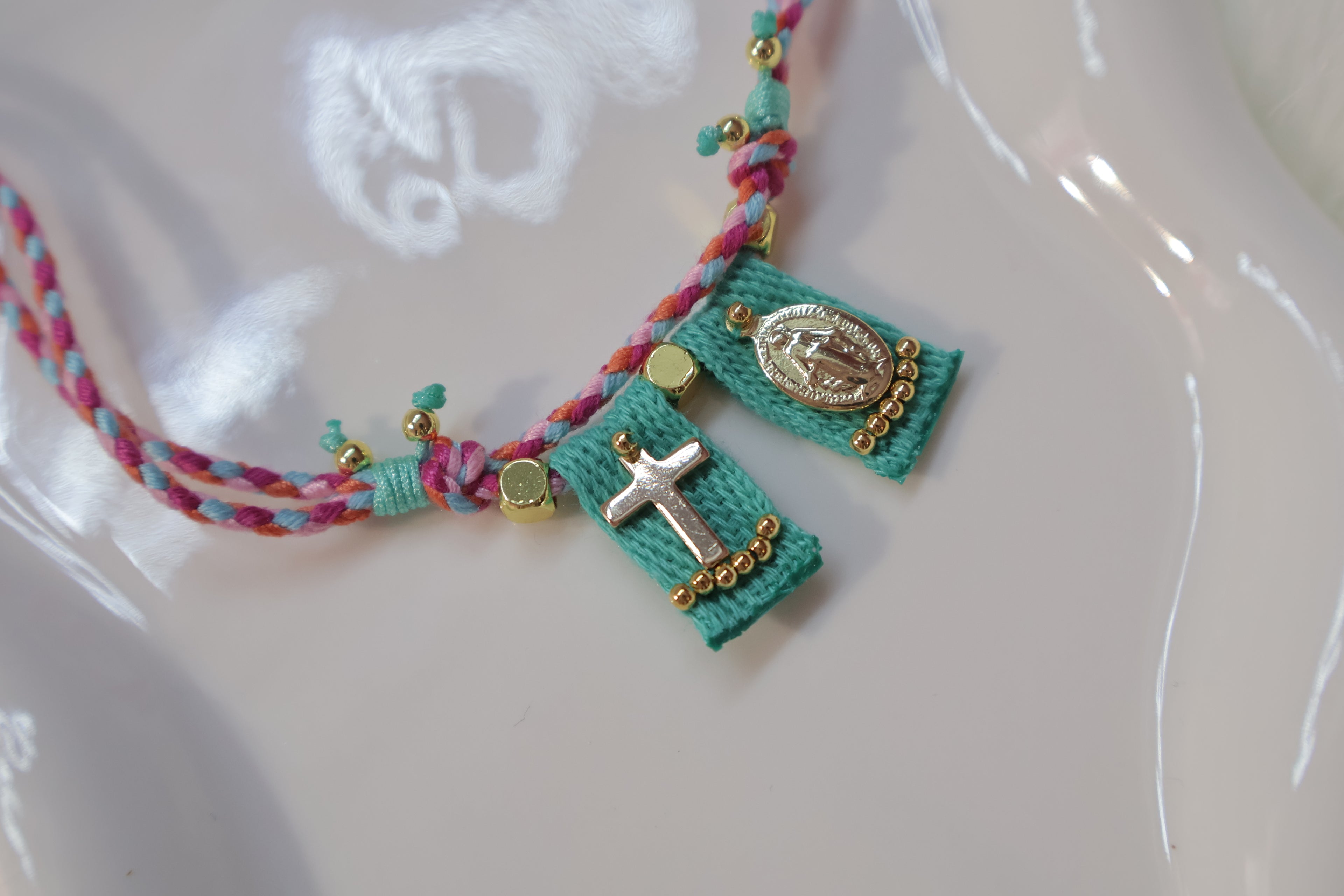 Fe Tejida Turquesa Escapulario
